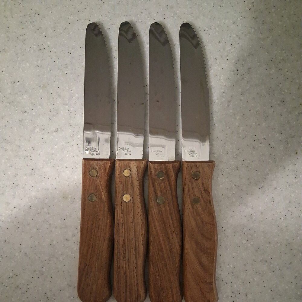 4  Oneida Jumbo Steak Knives Wood Handles Stainless Serrated Blades
